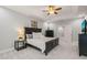Spacious primary bedroom with a tray ceiling, neutral carpet, and ample closet space at 108 Hundred Oaks Ln, Holly Springs, NC 27540