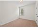 Bedroom featuring neutral walls, carpet flooring, and a window at 108 Teagan Ct, Chapel Hill, NC 27516