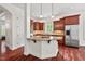 Kitchen with hardwood floors, granite countertops and a kitchen island at 108 Teagan Ct, Chapel Hill, NC 27516