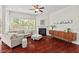 Comfortable living room with a fireplace, modern furnishings, and natural light at 108 Teagan Ct, Chapel Hill, NC 27516