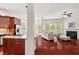 Open-concept space with a modern fireplace, hardwood floors, and lots of natural light at 108 Teagan Ct, Chapel Hill, NC 27516