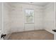 A walk-in closet features built-in shelving and a window at 108 Teagan Ct, Chapel Hill, NC 27516