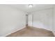 Bright bedroom featuring neutral walls and plush carpeting at 10900 Poole Rd, Wendell, NC 27591