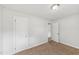 Bright bedroom featuring neutral walls and plush carpeting at 10900 Poole Rd, Wendell, NC 27591