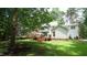 Expansive backyard featuring a spacious deck perfect for entertaining and outdoor relaxation at 12037 Deer Run, Raleigh, NC 27614