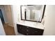 Bathroom with double sink vanity and mirror reflecting the walk-in shower at 12037 Deer Run, Raleigh, NC 27614