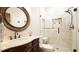 Modern bathroom with tiled shower, stone floors, and a vessel sink at 12037 Deer Run, Raleigh, NC 27614