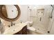 Modern bathroom with tiled shower, stone floors, and a vessel sink at 12037 Deer Run, Raleigh, NC 27614