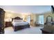 The main bedroom features decorative moulding, hardwood floors, and windows with natural light at 12037 Deer Run, Raleigh, NC 27614