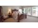 Bedroom with carpet, natural light, and decorative window treatments at 12037 Deer Run, Raleigh, NC 27614
