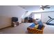 Large bonus room showcasing a seating area, work station, media center, and corner desk at 12037 Deer Run, Raleigh, NC 27614