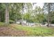 Community pool and clubhouse offering residents a place to relax and socialize in a serene, wooded setting at 12037 Deer Run, Raleigh, NC 27614