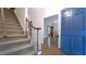 Lovely foyer with stairs, hardwood flooring, and view to adjoining room at 12037 Deer Run, Raleigh, NC 27614