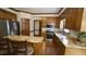 The kitchen has stainless steel appliances and a granite countertop island at 12037 Deer Run, Raleigh, NC 27614