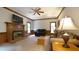 Comfortable living room with a brick fireplace, neutral carpet, and wood trim at 12037 Deer Run, Raleigh, NC 27614