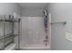 Bathroom featuring a full bathtub, shelving, and towel rack at 121 Longleaf Pine St, Clayton, NC 27527