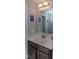 Bathroom featuring marble countertops, ample lighting, and stylish fixtures at 121 Longleaf Pine St, Clayton, NC 27527
