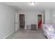 Bedroom showing access to two bathrooms and an attic at 121 Longleaf Pine St, Clayton, NC 27527