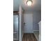 Inviting foyer with wood-look flooring, a white front door, and stairs leading to the upper level at 121 Longleaf Pine St, Clayton, NC 27527