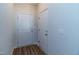 Bright foyer featuring neutral walls, wood-look floors, and two white doors, creating a clean and welcoming entrance at 121 Longleaf Pine St, Clayton, NC 27527