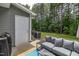 Back patio featuring a comfortable seating arrangement with shade at 121 Longleaf Pine St, Clayton, NC 27527