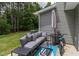 Outdoor patio area with comfortable seating, ideal for relaxation and entertaining at 121 Longleaf Pine St, Clayton, NC 27527