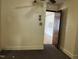 Bedroom with neutral-toned walls and access to adjoining room at 129 S Bullock St, Henderson, NC 27536