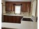 Functional kitchen with plenty of counter space and storage cabinets at 129 S Bullock St, Henderson, NC 27536