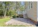 Charming backyard with a paver patio and deck, perfect for outdoor enjoyment at 1304 Trailing Rose Ct, Wake Forest, NC 27587