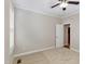 Spacious bedroom featuring a ceiling fan, carpeted floors, and a doorway to a closet at 1304 Trailing Rose Ct, Wake Forest, NC 27587