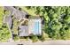 Aerial view of the community pool, clubhouse, and parking area at 1304 Trailing Rose Ct, Wake Forest, NC 27587