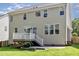 Back exterior view featuring siding, windows, a deck, and a patio at 1304 Trailing Rose Ct, Wake Forest, NC 27587