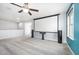 Spacious bonus room featuring carpeted floors, a mounted projector screen, and neutral paint at 1305 Ivey Grove Ct, Fuquay Varina, NC 27526