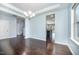 Dining room showcasing hardwood floors, recessed lighting, and a view into the kitchen area at 1305 Ivey Grove Ct, Fuquay Varina, NC 27526