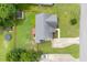 An overhead perspective shows the property's backyard, including a deck and fenced yard at 1309 Sweet Charm Ln, Knightdale, NC 27545