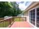 Relax on this home's charming, enclosed back deck, perfect for quiet evenings or entertaining guests at 1309 Sweet Charm Ln, Knightdale, NC 27545