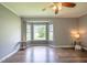 Bright bedroom with a large bay window, letting in natural light and offering a peaceful view of the surroundings at 1309 Sweet Charm Ln, Knightdale, NC 27545