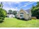 Attractive home with lush greenery, well-kept lawn, and a clean exterior at 1309 Sweet Charm Ln, Knightdale, NC 27545