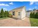 This garage features a brick paved driveway, single door, and manicured lawn at 1330 Rodessa, Raleigh, NC 27607