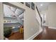 Cozy playroom under the stairs, with shelving for books, toys, and a comfortable plush rug at 1330 Rodessa, Raleigh, NC 27607