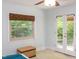Bedroom showcasing a view of lush greenery and inviting outdoor access at 1405 Pennsylvania Ave, Durham, NC 27705