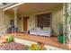 Inviting front porch featuring comfortable seating, creating a cozy outdoor living space at 1405 Pennsylvania Ave, Durham, NC 27705