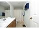 Bathroom featuring nice cabinets, shower curtain and a scale. It has a blue shelf with towels at 146 Greenmont Ln, Cary, NC 27511