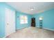 Bright bedroom with natural light, featuring a large window and ample space for furniture at 146 Greenmont Ln, Cary, NC 27511