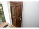 Close-up of the attractive, paneled wooden front door with brick entrance at 146 Greenmont Ln, Cary, NC 27511