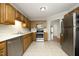 Functional kitchen with stainless steel appliances, ample cabinet space, and a light color scheme at 146 Greenmont Ln, Cary, NC 27511