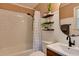 Bright bathroom featuring modern fixtures, a subway tile shower, and stylish decor at 1613 Euclid Rd, Durham, NC 27713