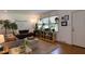 Inviting living room with hardwood floors, lots of natural light, and cozy furniture at 1613 Euclid Rd, Durham, NC 27713