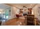 Inviting living room offering fireplace, built-in bookshelves, hardwood floors, and a seamless flow into the dining area at 1613 Euclid Rd, Durham, NC 27713