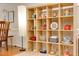 Open shelving displays decorative items next to the dining room table, showing the house's interior at 1613 Euclid Rd, Durham, NC 27713